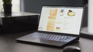 empty desk with analytics data on a computer